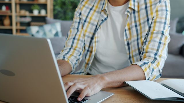a person researching on a laptop